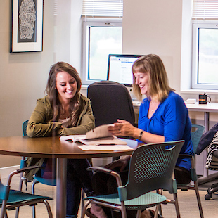 a woman coaching some students